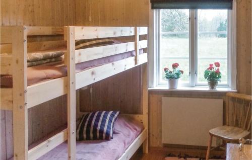 Krevet ili kreveti na sprat u jedinici u okviru objekta Nice Home In Bstad With 4 Bedrooms