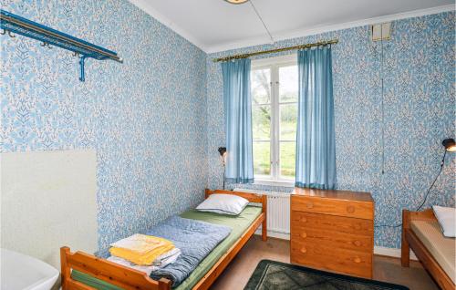 Кровать или кровати в номере Awesome Home In Grsmark With Sauna