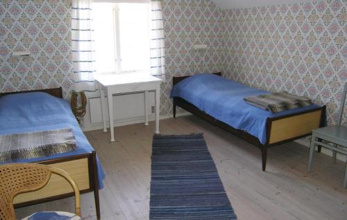 Postel nebo postele na pokoji v ubytování 4 Bedroom Nice Home In Bottnaryd