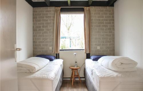 Postel nebo postele na pokoji v ubytování Lovely Home In Reutum With Wifi