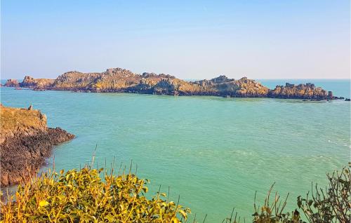 an island in the middle of a body of water at 2 Bedroom Awesome Apartment In Antrain in Antrain