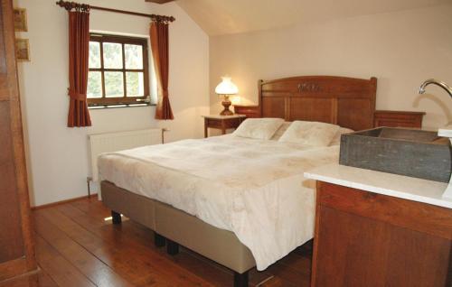 Кровать или кровати в номере Vue Sur La Valle