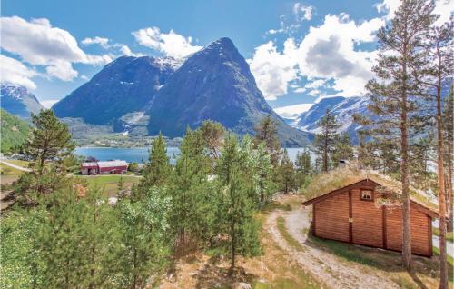 a cabin with a view of a mountain at Glomnes Nr 2 in Hjelle