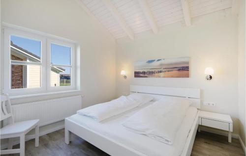 Llit o llits en una habitació de Lovely Home In Dagebll With Sauna