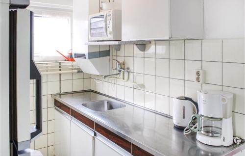 Cuisine ou kitchenette dans l'établissement Huisje Zand En Water