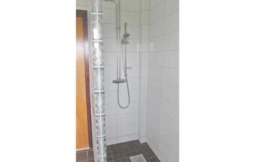 a shower with a glass enclosure in a bathroom at Stunning home in Bolms with 4 Bedrooms, Sauna and WiFi in Bolmsö