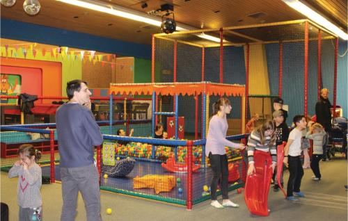 a group of people playing in a indoor playground at 3 Bedroom Beautiful Home In Bruinisse in Bruinisse