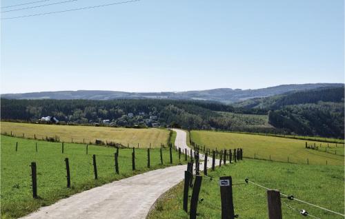 a dirt road in the middle of a field at Nadrin O Vert in Nadrin