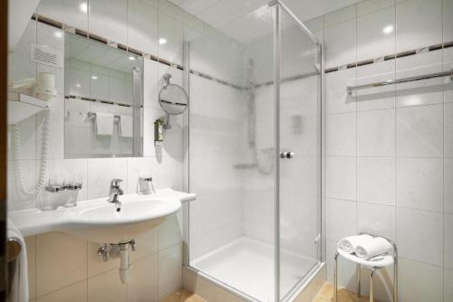 Kúpeľňa v ubytovaní Apartments Tschanun