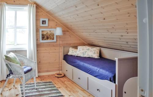 Säng eller sängar i ett rum på Beautiful Home In Egersund With 4 Bedrooms And Wifi