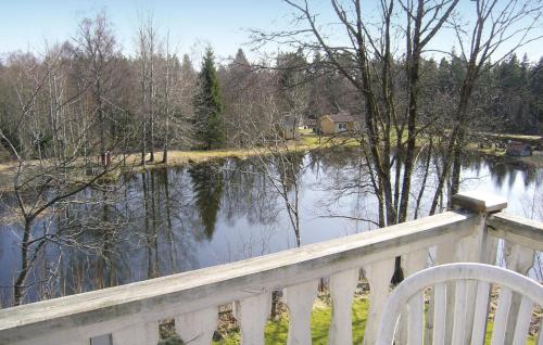 a view of a river from a wooden bridge at Stunning Home In Östra Frölunda in Östra Frölunda