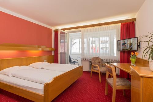 Postel nebo postele na pokoji v ubytování Hotel Jägerhaus