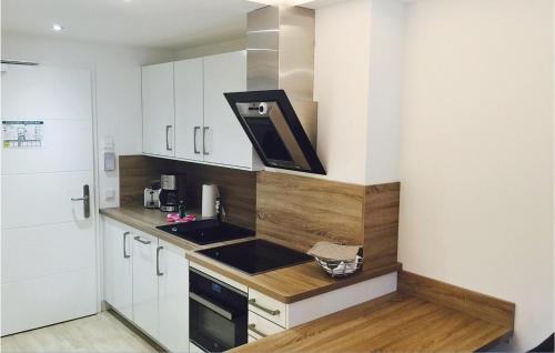 Kuchyň nebo kuchyňský kout v ubytování Baltic