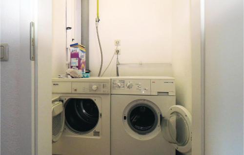a laundry room with a washer and dryer at Two-Bedroom Holiday Home In Hachenburg in Hachenburg