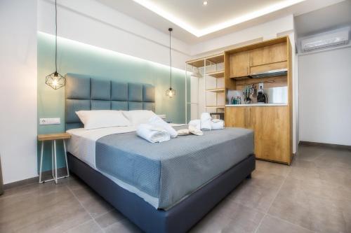 Ένα ή περισσότερα κρεβάτια σε δωμάτιο στο Azzurro Deluxe