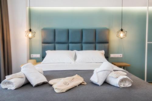 Ένα ή περισσότερα κρεβάτια σε δωμάτιο στο Azzurro Deluxe