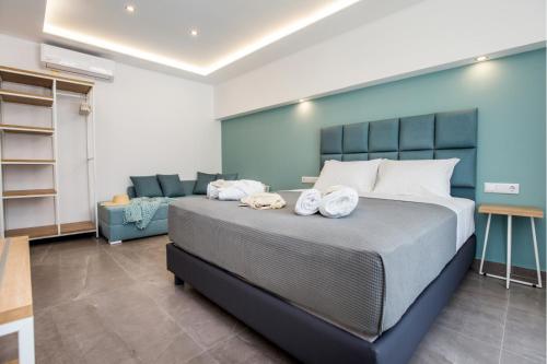 Ένα ή περισσότερα κρεβάτια σε δωμάτιο στο Azzurro Deluxe