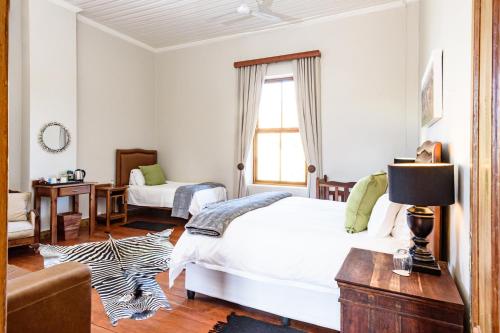 Katil atau katil-katil dalam bilik di Chargo Boutique Lodge