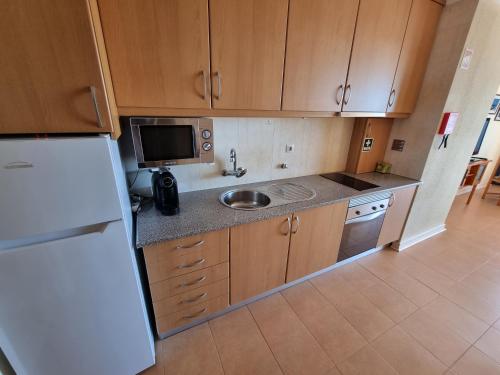 Apartamento junto a Praia com piscina.