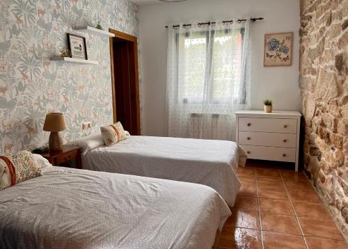 Postel nebo postele na pokoji v ubytování Galicia Getaway - A Casa dos Cancelos