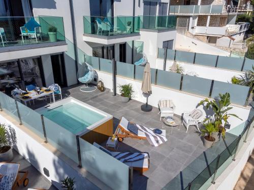 an aerial view of a building with a swimming pool at NEW! ReLux - ZF Hvar in Hvar