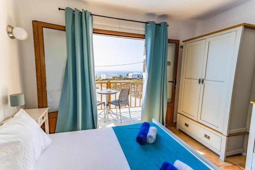 Ένα ή περισσότερα κρεβάτια σε δωμάτιο στο El Callao II Suites