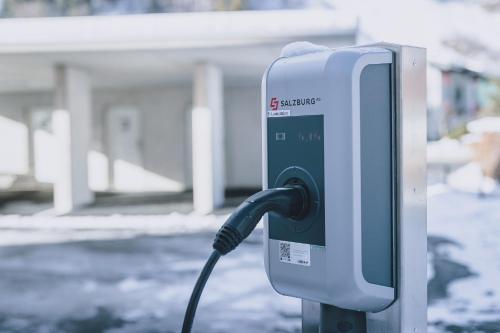a pay phone with a cord plugged into it at M1 - Mountain Living in Rauris