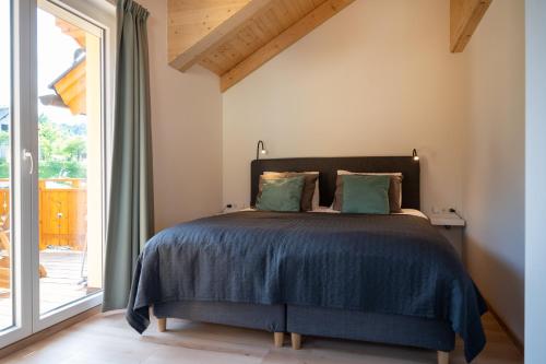 Postel nebo postele na pokoji v ubytování Casa Drei Mädel - winter en zomer