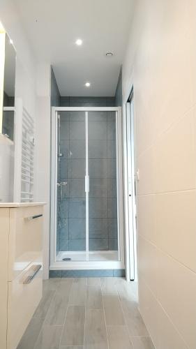 Kúpeľňa v ubytovaní Charmant et lumineux logement, au cœur de Cabourg