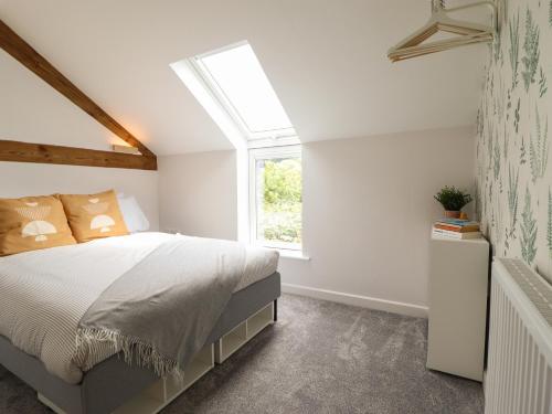 Postel nebo postele na pokoji v ubytování Little Nook