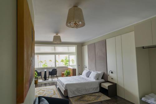 Postel nebo postele na pokoji v ubytování Hotel Pirro