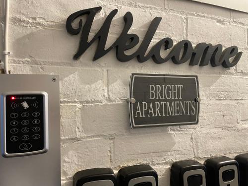 a sign on a wall with a sign that reads melbourne flight attendants at Bright Apartments in Peterborough