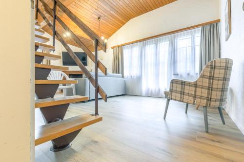 Posezení v ubytování Apartment Eiger - Aare Jungfrau AG