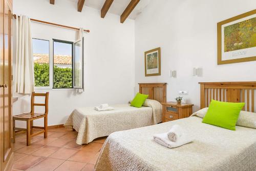 A bed or beds in a room at Villa Violeta by Villa Plus