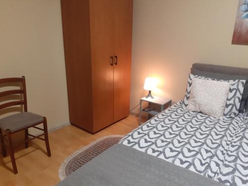 Postel nebo postele na pokoji v ubytování Apartman Ana