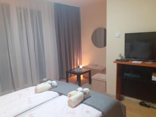 Postel nebo postele na pokoji v ubytování Apartman Ana
