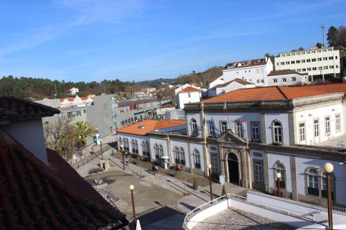 a view of a city with white buildings at Hot Water Guest House in Termas de Sao Pedro do Sul