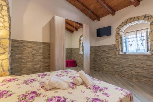 Posteľ alebo postele v izbe v ubytovaní "la Casina del forno con piscina fra Catania e Siracusa "