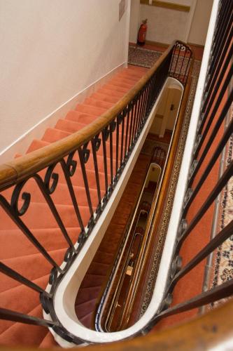 an overhead view of a staircase in a building at Hotel des 4 Soeurs in Bordeaux