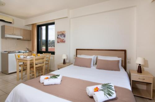 Postel nebo postele na pokoji v ubytování Margarita Beach Hotel
