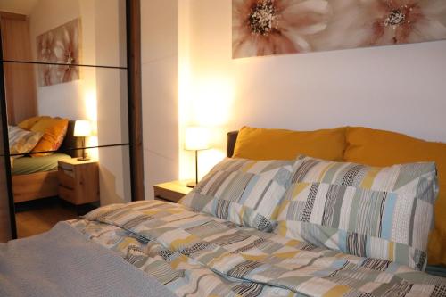 Postel nebo postele na pokoji v ubytování Apartman Mila 21