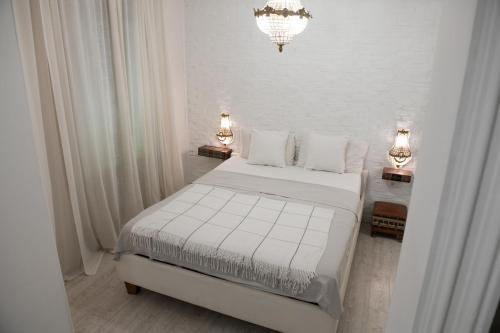 Giường trong phòng chung tại Apartment Silicon Valley