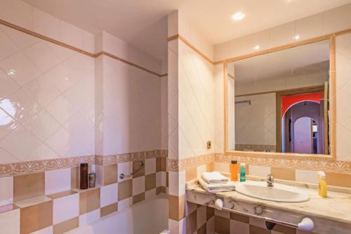 A bathroom at Villa Silvia II by Villa Plus