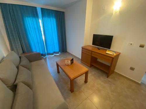 TV a/nebo společenská místnost v ubytování Bahía Serena