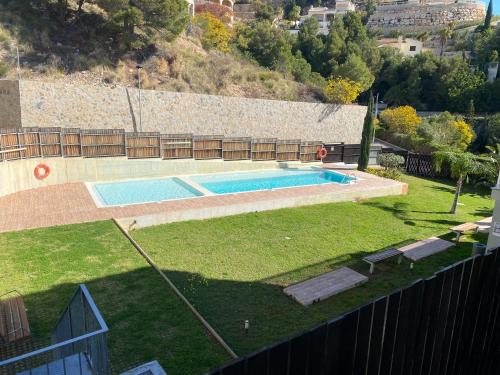 Het zwembad bij of vlak bij Casa del Sol