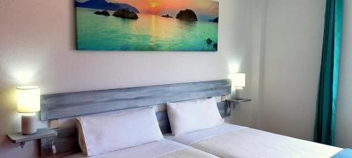 Кровать или кровати в номере Apartamento del Mar