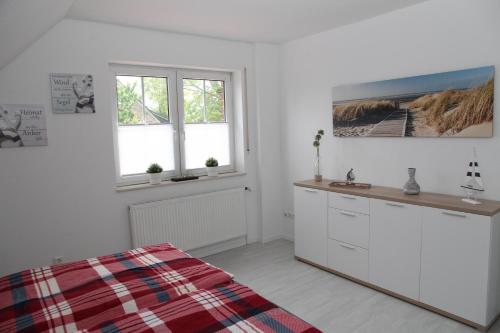 Kuchyň nebo kuchyňský kout v ubytování Haus Deichterrasse