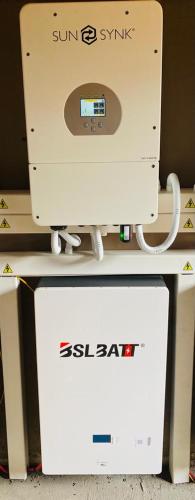 a computer monitor sitting on top of a box at Cottonwood Guesthouse Oasis in Bloemfontein