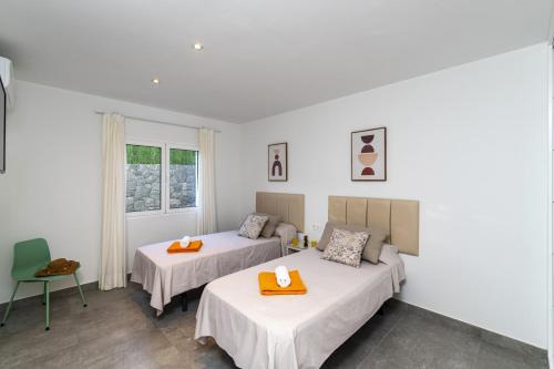 Postel nebo postele na pokoji v ubytování Villa Aqualava 1 by Villa Plus