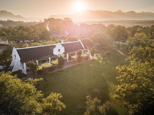 a view from a balcony overlooking a beach at Spier Hotel and Wine Farm in Stellenbosch